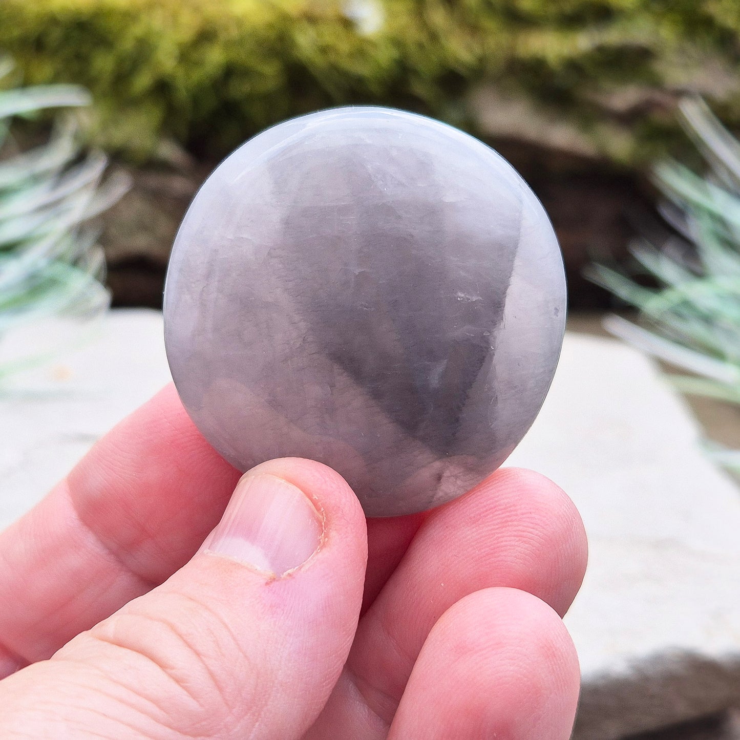 Lunar Quartz Crystal or Lunar Rose Quartz Crystal Palm Stone is from one source in Namibia. Luna Quartz (or Lunar Rose Quartz)is a unique combination of Rose Quartz and Graphite