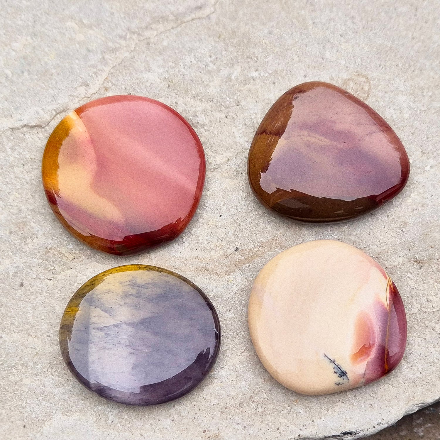 Mookaite Crystal Palm Stone. From Mooka Creek Region, Western Australia. Lovely variety of colours available in these palm stones, just choose the one you like.