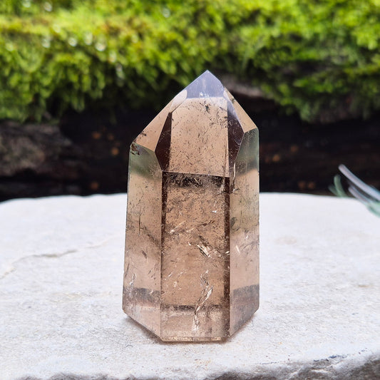 Smoky quartz crystal, a natural gemstone promoting emotional balance and clarity, ideal for meditation and crystal healing.