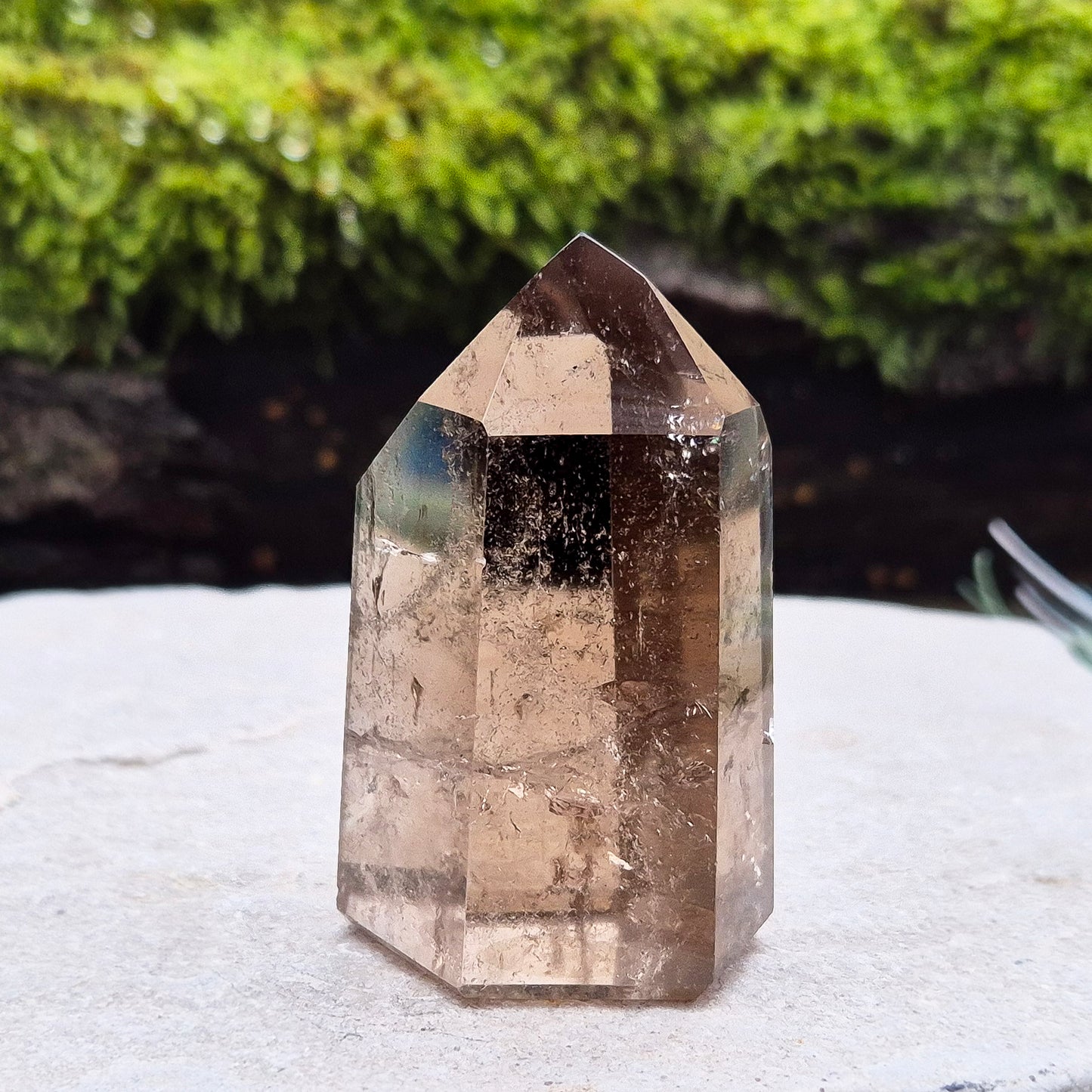 Smoky quartz crystal, a natural gemstone promoting emotional balance and clarity, ideal for meditation and crystal healing.