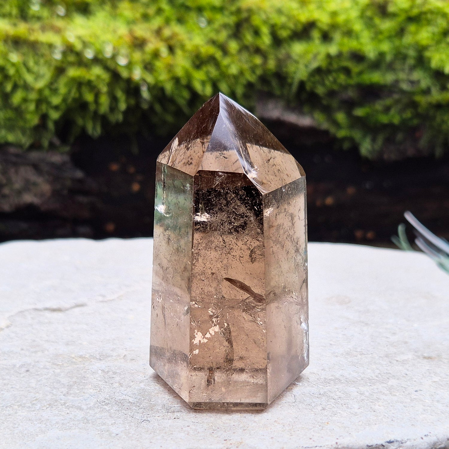 Smoky quartz crystal, a natural gemstone promoting emotional balance and clarity, ideal for meditation and crystal healing.