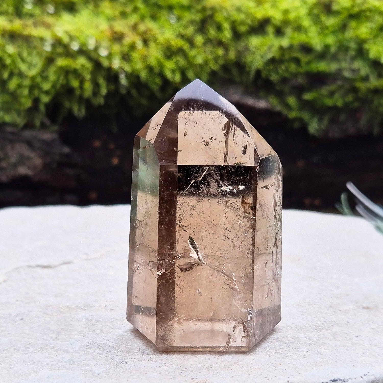 Smoky quartz crystal, a natural gemstone promoting emotional balance and clarity, ideal for meditation and crystal healing.