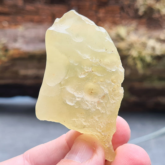 Experience the cosmic energy of this AAA grade Libyan Desert Glass, a rare gemstone Known for enhancing spiritual growth, intuition, and protection. 