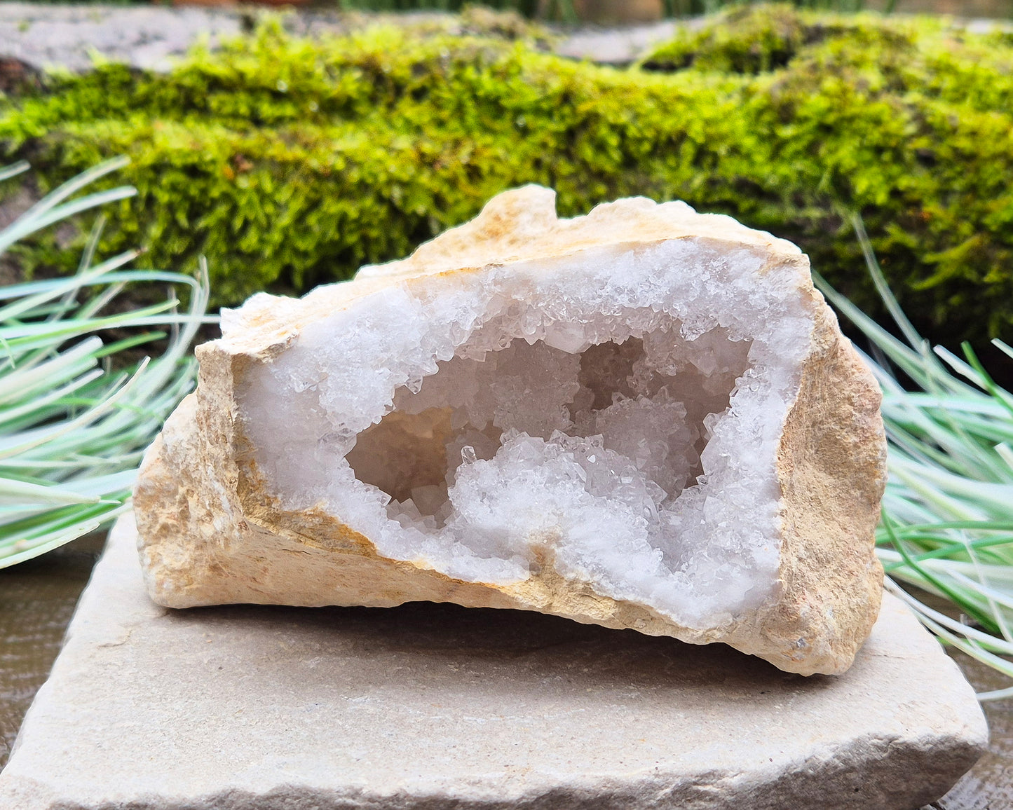 White Quartz Crystal Geode Pair, from Morocco. Lovely sparkling white quartz crystal formations in both sections of the geode. Both pieces self stand.