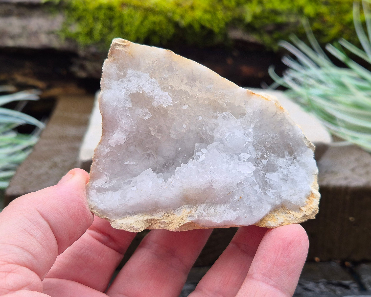 White Quartz Crystal Geode Pair, from Morocco. Lovely sparkling white quartz crystal formations in both sections of the geode. Both pieces self stand.