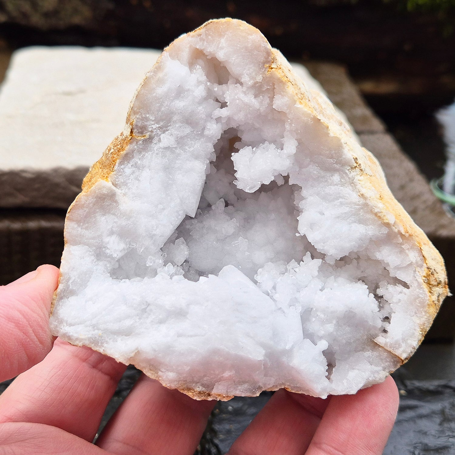 White Quartz Crystal Geode Half, from Morocco. Jam packed with lovely sparkling white quartz crystal formations. It can sit on its own on an even surface.