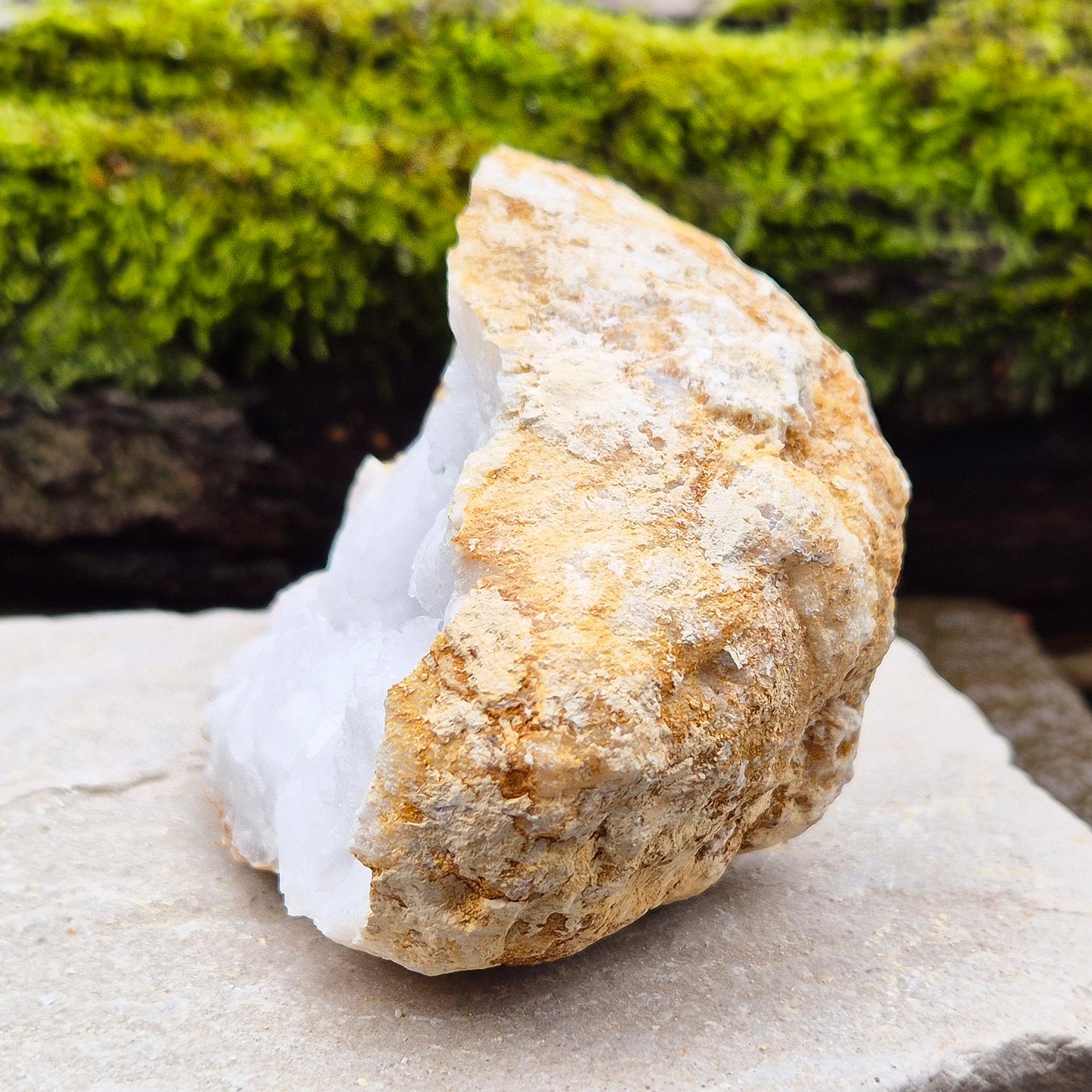 White Quartz Crystal Geode Half, from Morocco. Jam packed with lovely sparkling white quartz crystal formations. It can sit on its own on an even surface.