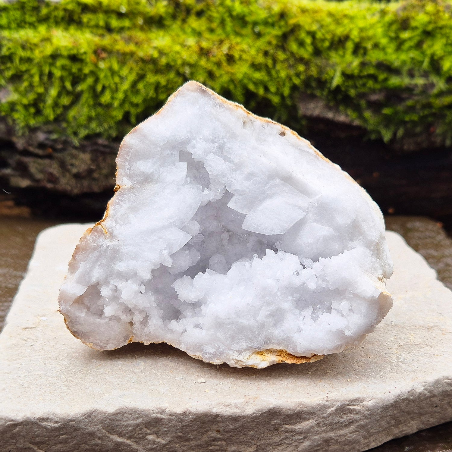 White Quartz Crystal Geode Half, from Morocco. Packed full of lovely sparkling white quartz crystal formations. It can sit on its own on an even surface.