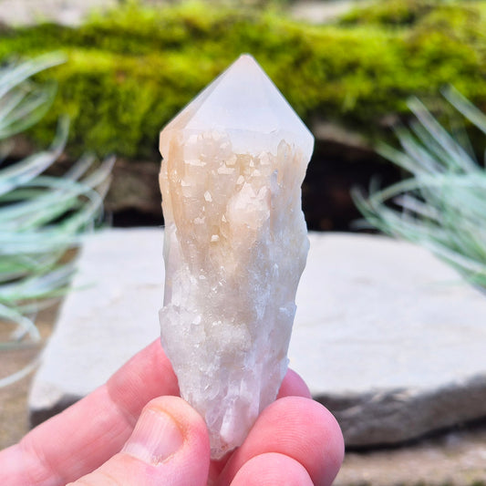 Candle Quartz Crystal Point from Madagascar, a single point with an appearance like melted wax flowing down the core, also known as Celestial Candle Quartz or Pineapple Quartz.