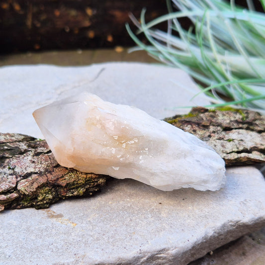 Enhance emotional healing and abundance with Candle Quartz