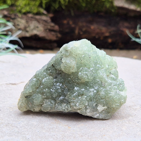 Natural Prehnite Crystal Cluster from New South Wales, Australia. Sparkly prehnite crystals with a mid tone green colour on the top and a darker green colour on the other side.