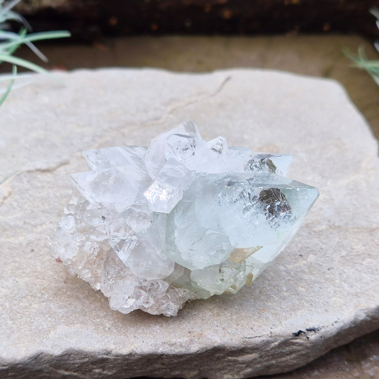 Apophyllite Crystal Cluster From India. Great quality crystal clear Apophyllite crystal formations in this cluster, the larger point has a light green 'tint' to it