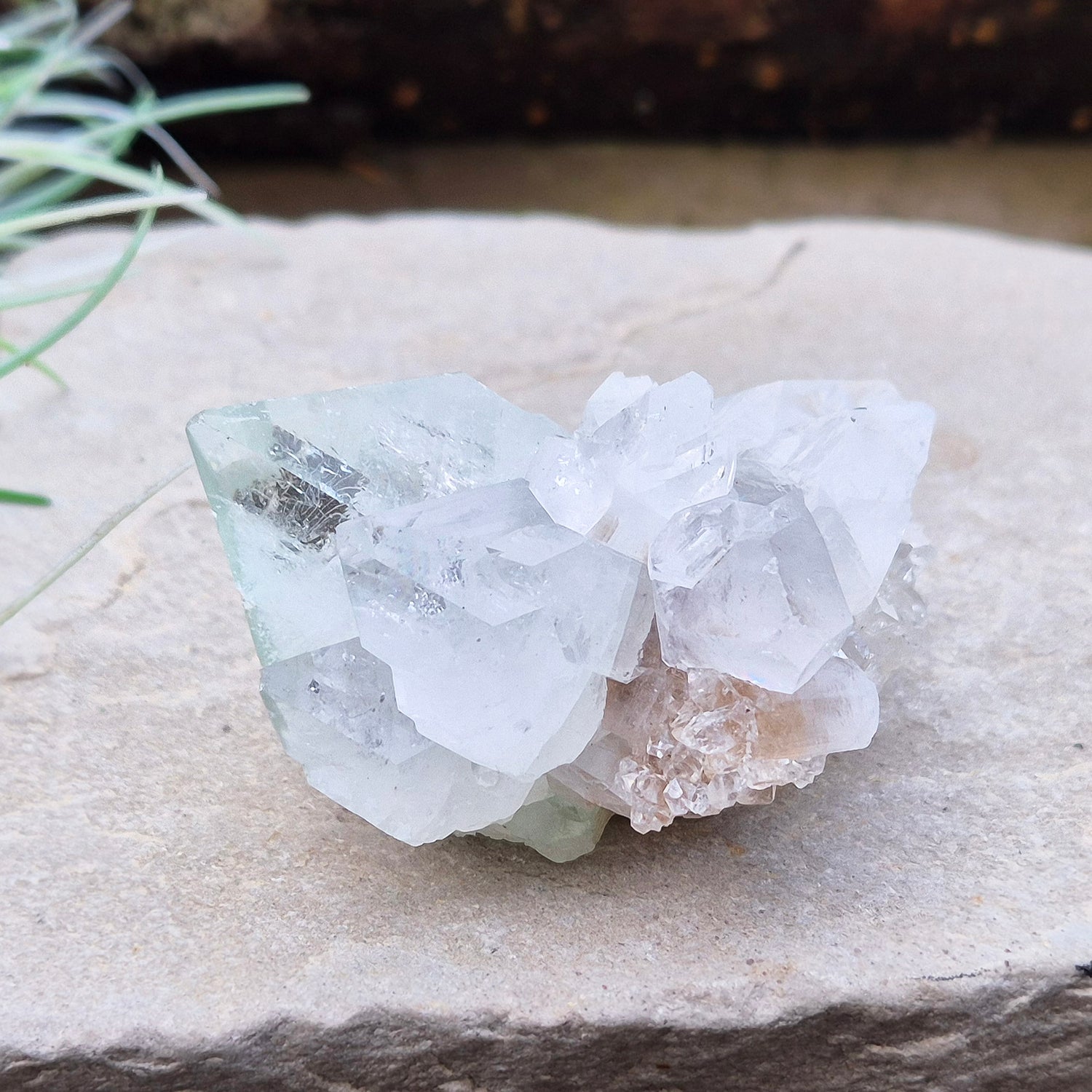 Apophyllite Crystal Cluster From India. Great quality crystal clear Apophyllite crystal formations in this cluster, the larger point has a light green 'tint' to it