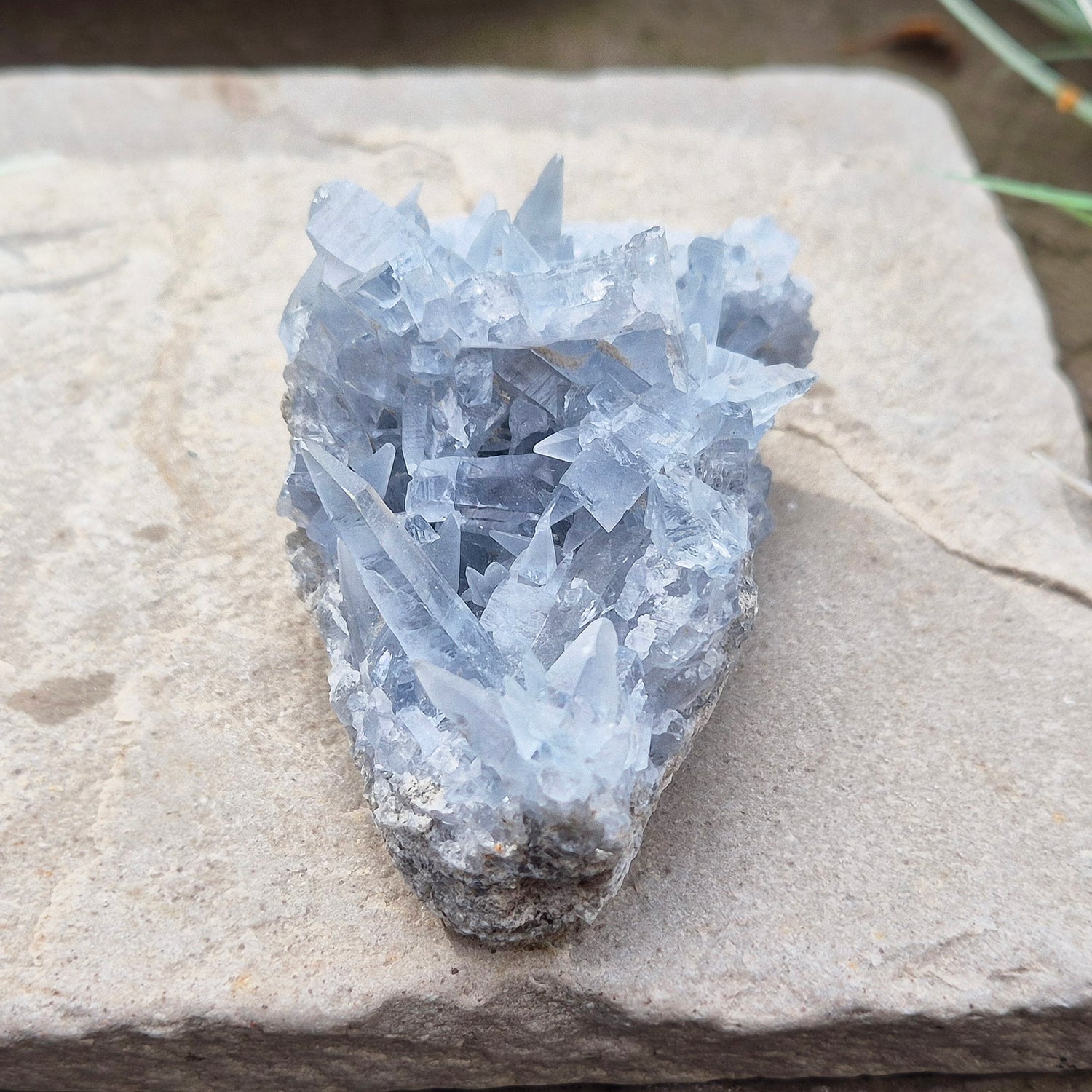 Celestite Crystal Cluster from Madagascar. This cluster has lovely sparkling pale ice blue celestite crystals on its base matrix