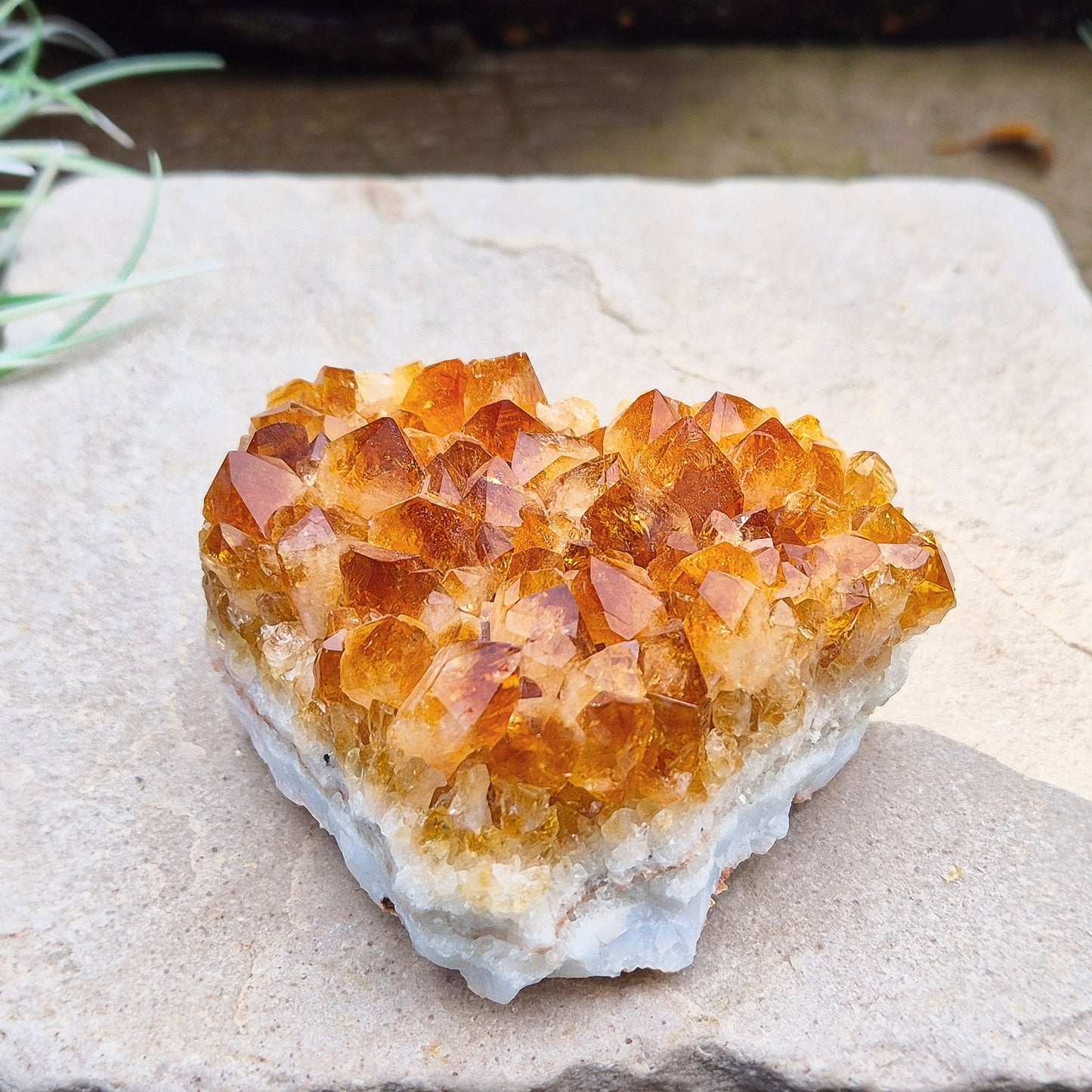 Citrine Crystal Cluster, Natural. From Brazil. Wonderful mid tone orange points on an even base which is even enough to sit on a flat surface.