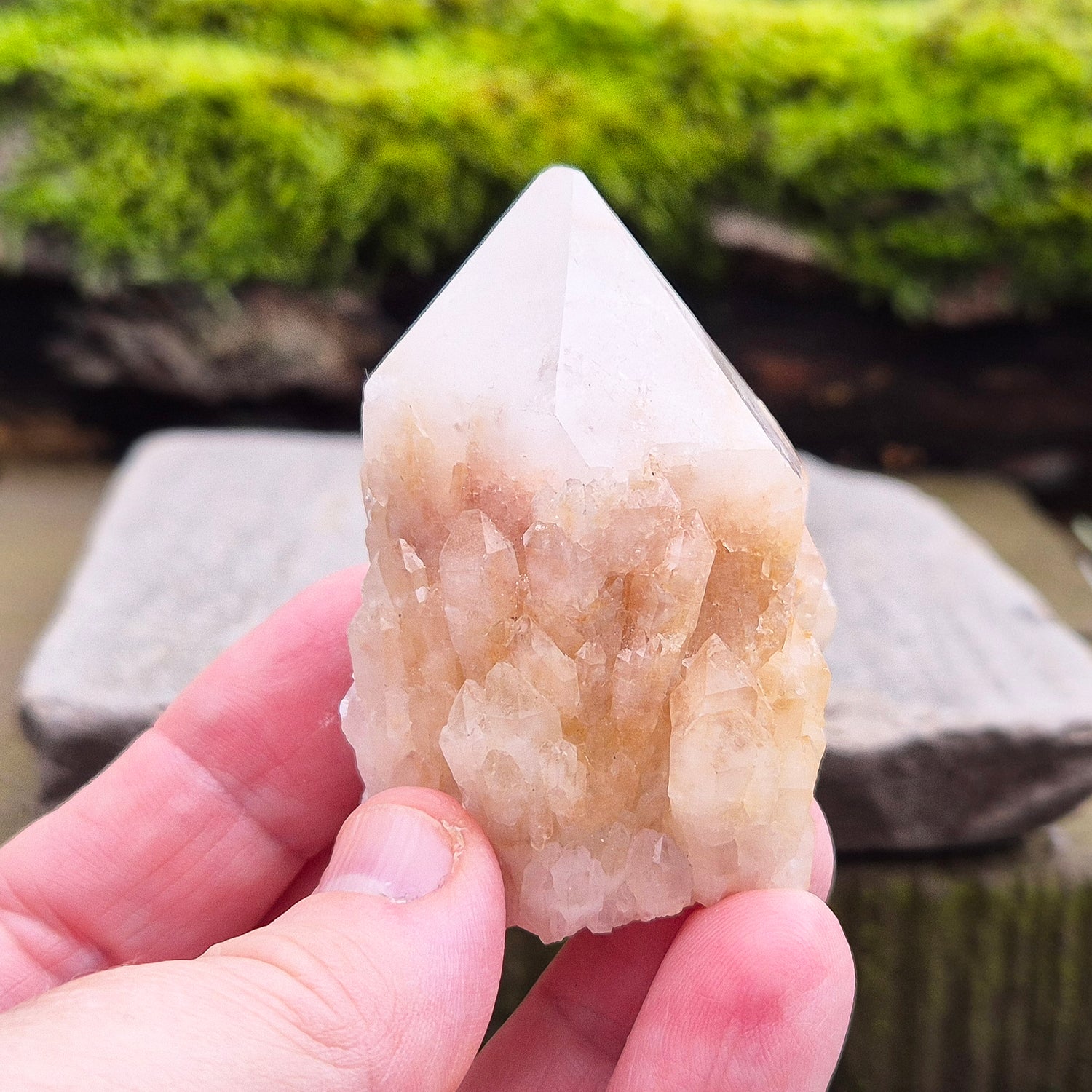 Candle Quartz Crystal Point from Madagascar, self-standing, with an appearance like melted wax flowing down the core, also known as Celestial Candle Quartz or Pineapple Quartz.