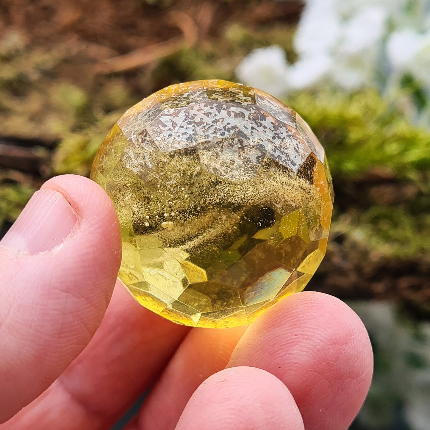 Warm, golden amber sphere with faceted round shape, ideal for calming energy, protection, and balancing emotions. Perfect for collectors, healers and you.