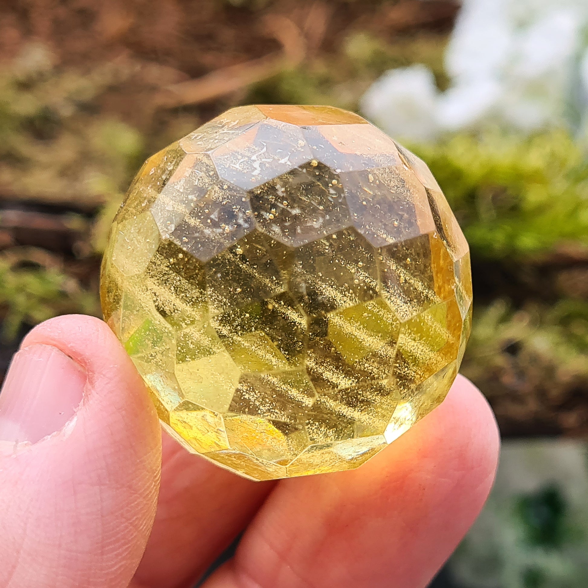 Warm, golden amber sphere with faceted round shape, ideal for calming energy, protection, and balancing emotions. Perfect for collectors, healers and you.