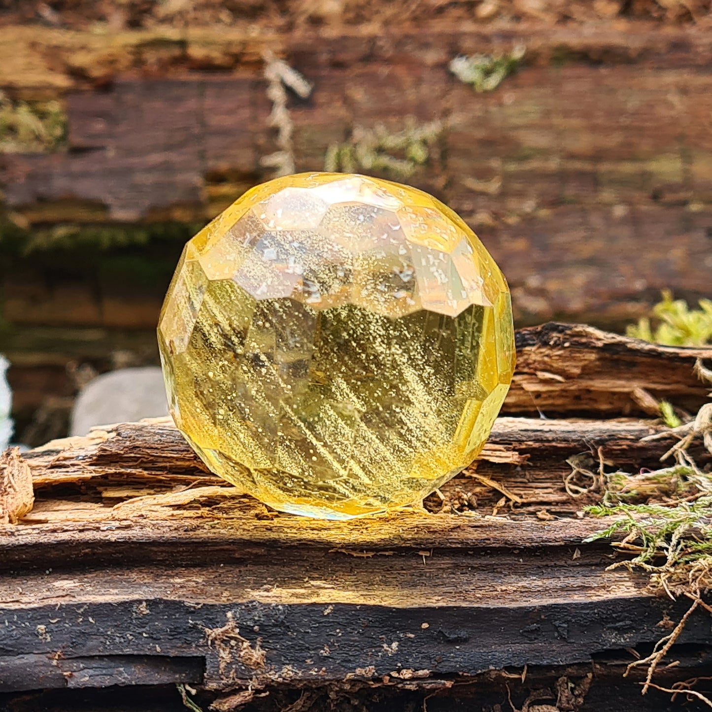 Warm, golden amber sphere with faceted round shape, ideal for calming energy, protection, and balancing emotions. Perfect for collectors, healers and you.