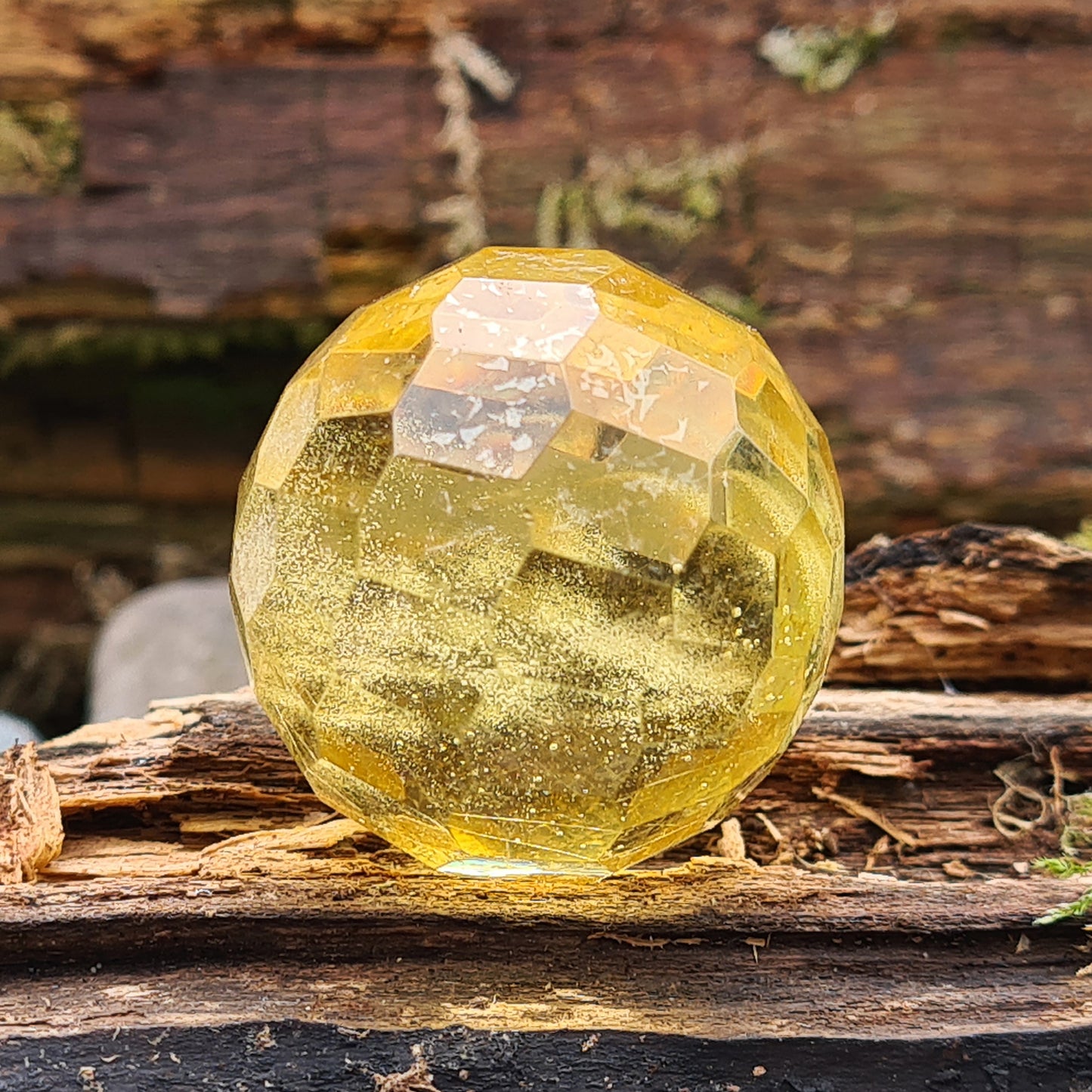 Warm, golden amber sphere with faceted round shape, ideal for calming energy, protection, and balancing emotions. Perfect for collectors, healers and you.