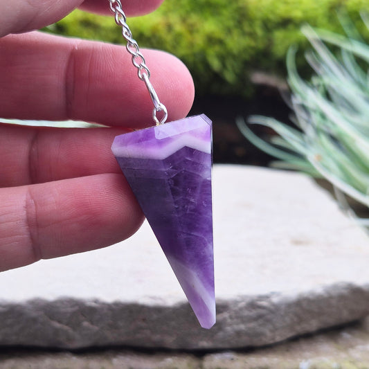 Chevron Amethyst Crystal Pendulum with a purple bead at the end of the chain. 