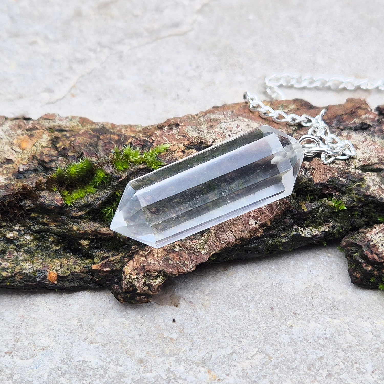 Quartz Crystal Pendulum, Clear Quartz Dowser, this is a double terminated crystal. Comes in a box or pouch to keep it in.