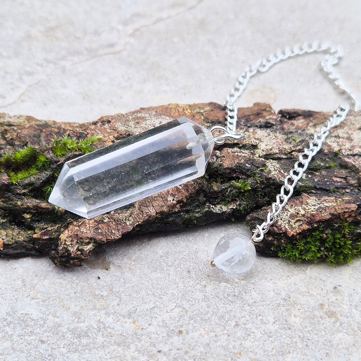 Quartz Crystal Pendulum, Clear Quartz Dowser, this is a double terminated crystal. Comes in a box or pouch to keep it in.