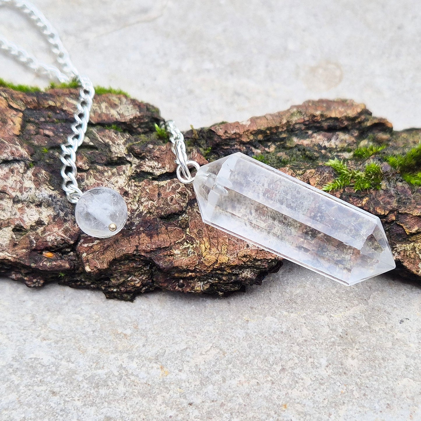 Quartz Crystal Pendulum, Clear Quartz Dowser, this is a double terminated crystal. Comes in a box or pouch to keep it in.