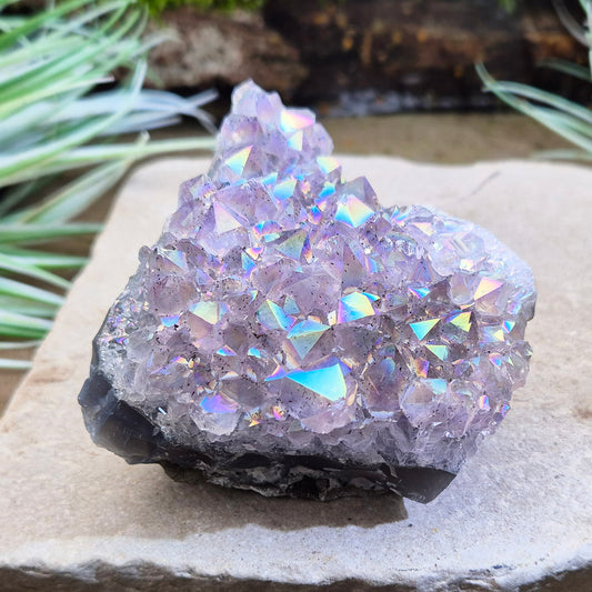 Aura Amethyst delivers peace, chakra healing, intuition boost, and energy block release, wrapping your aura in rejuvenating rainbow hues.