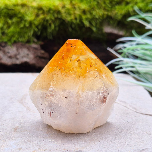 Citrine Crystal Standing Point from Brazil. Has light reflecting inclusions at the tip. 