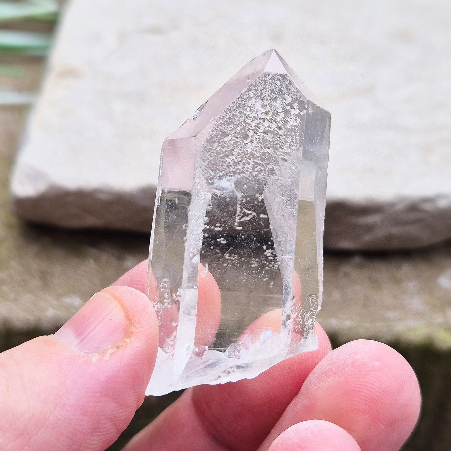 Starbrary Quartz Crystal Point From Brazil. This crystal is a point has nice clarity and lovely Starbrary markings on 3 sides.