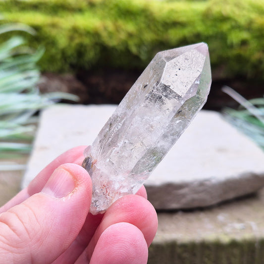 Starbrary Quartz Crystal Point From Brazil. This crystal is a point has nice clarity and lovely Starbrary markings on at least 2 sides.