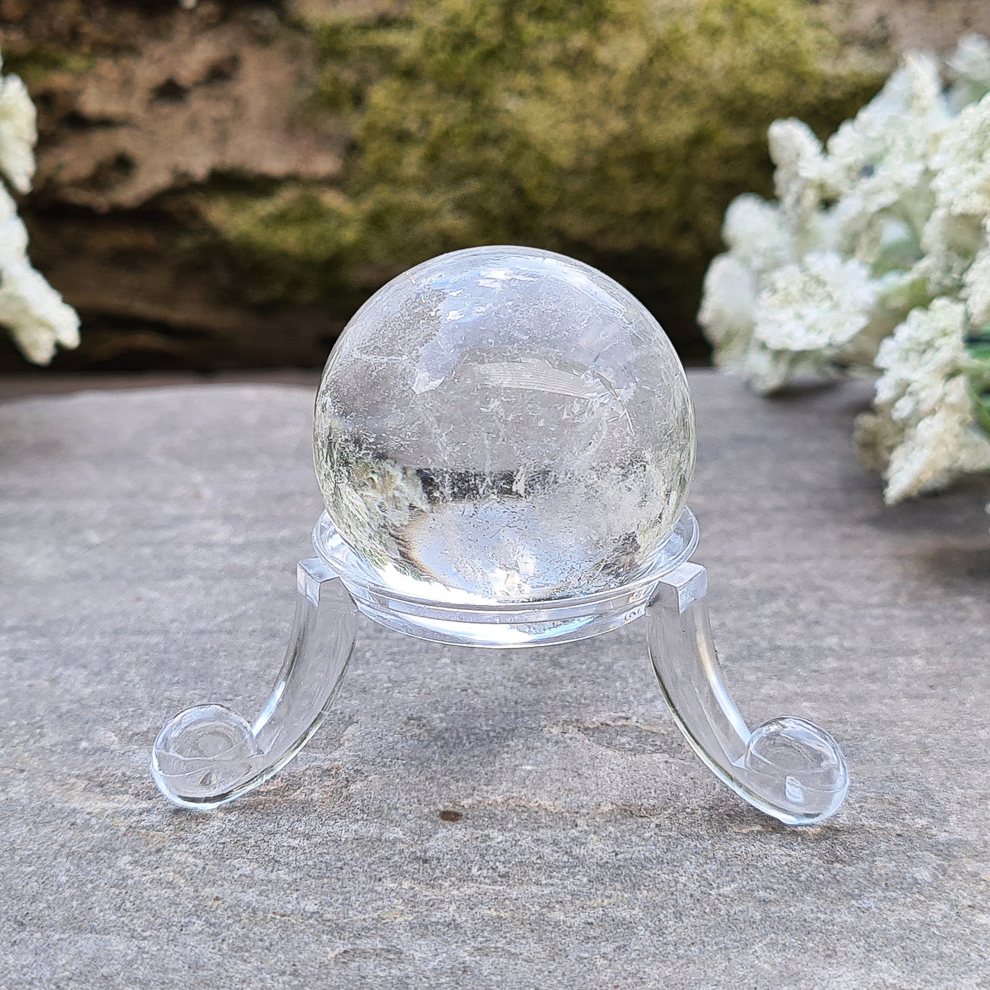 Elevate energy and decor with our clear quartz sphere. Perfect for healing, meditation, and balance. Add timeless beauty to any space.