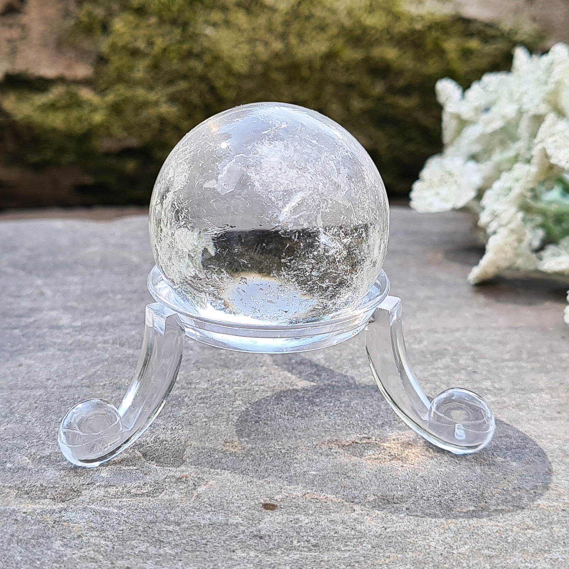 Elevate energy and decor with our clear quartz sphere. Perfect for healing, meditation, and balance. Add timeless beauty to any space.