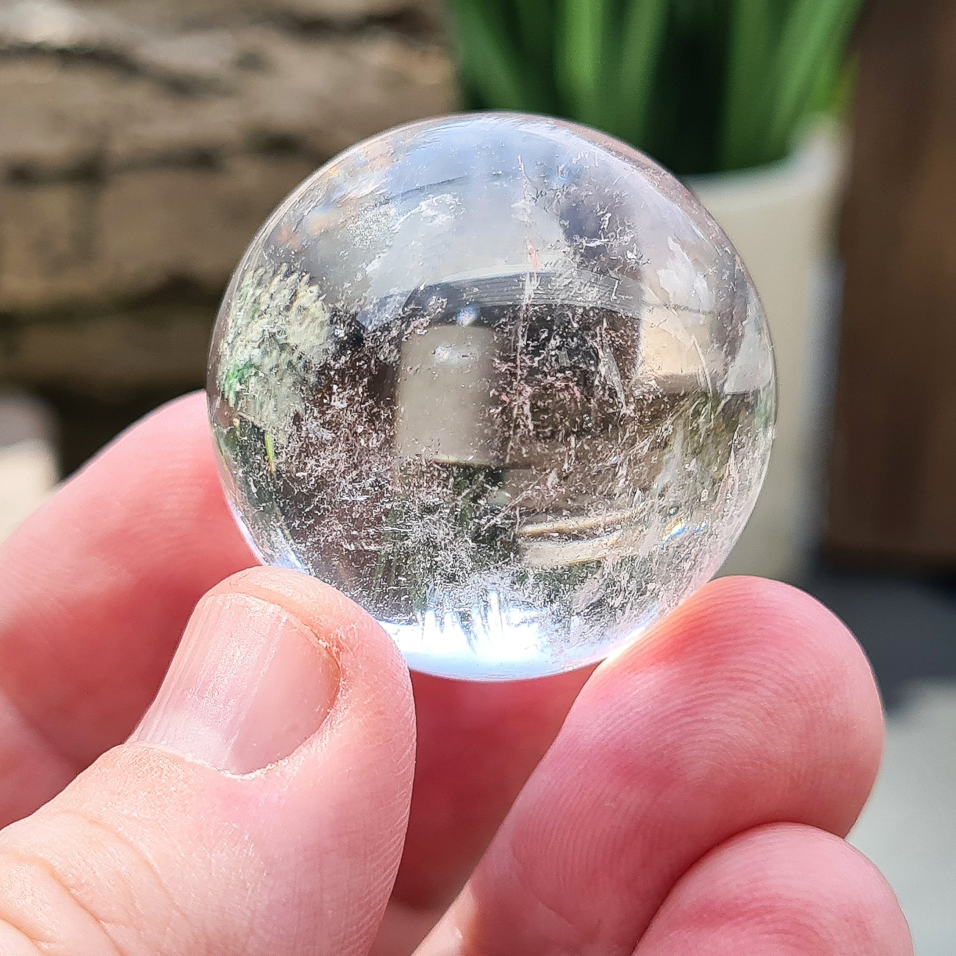 Elevate energy and decor with our clear quartz sphere. Perfect for healing, meditation, and balance. Add timeless beauty to any space.