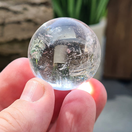 Quartz Crystal Sphere, Quartz Crystal Ball, Mini Sphere from Brazil. Does not come with a stand.