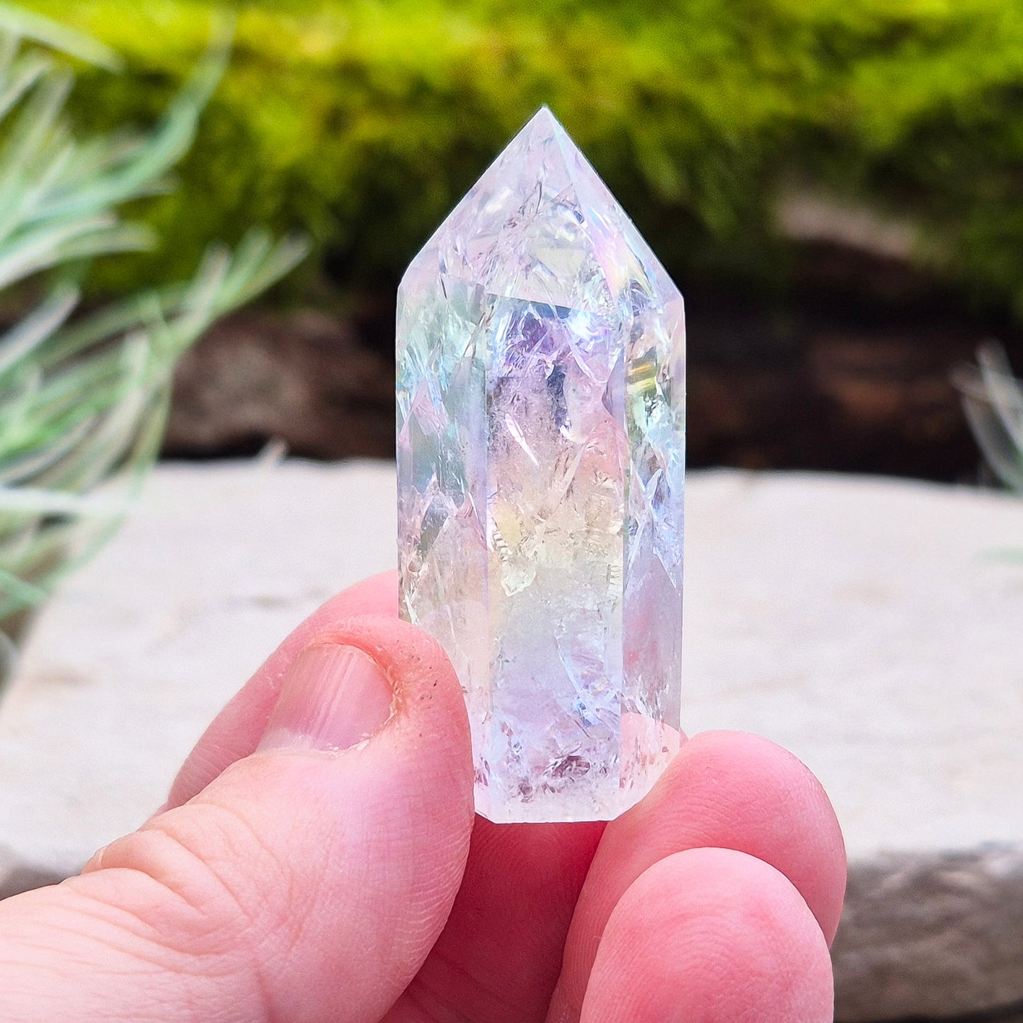 Aura Fire and Ice Quartz Polished Standing Point and also known as Unicorn Horns, Angel Aura Fire and Ice and Rainbow Quartz. 