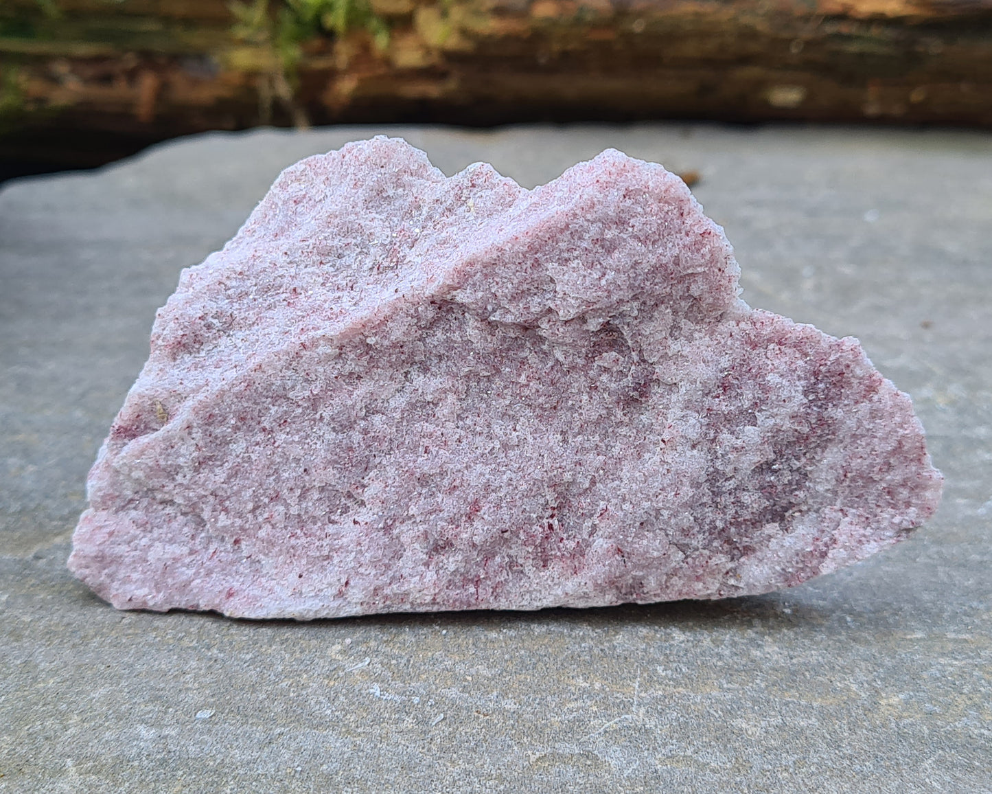 Discover the gentle energy of Pink Thulite. A beautiful palm stone to boost vitality, self-expression, and playful, heart-led energy.