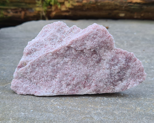 Discover the gentle energy of Pink Thulite. A beautiful palm stone to boost vitality, self-expression, and playful, heart-led energy.