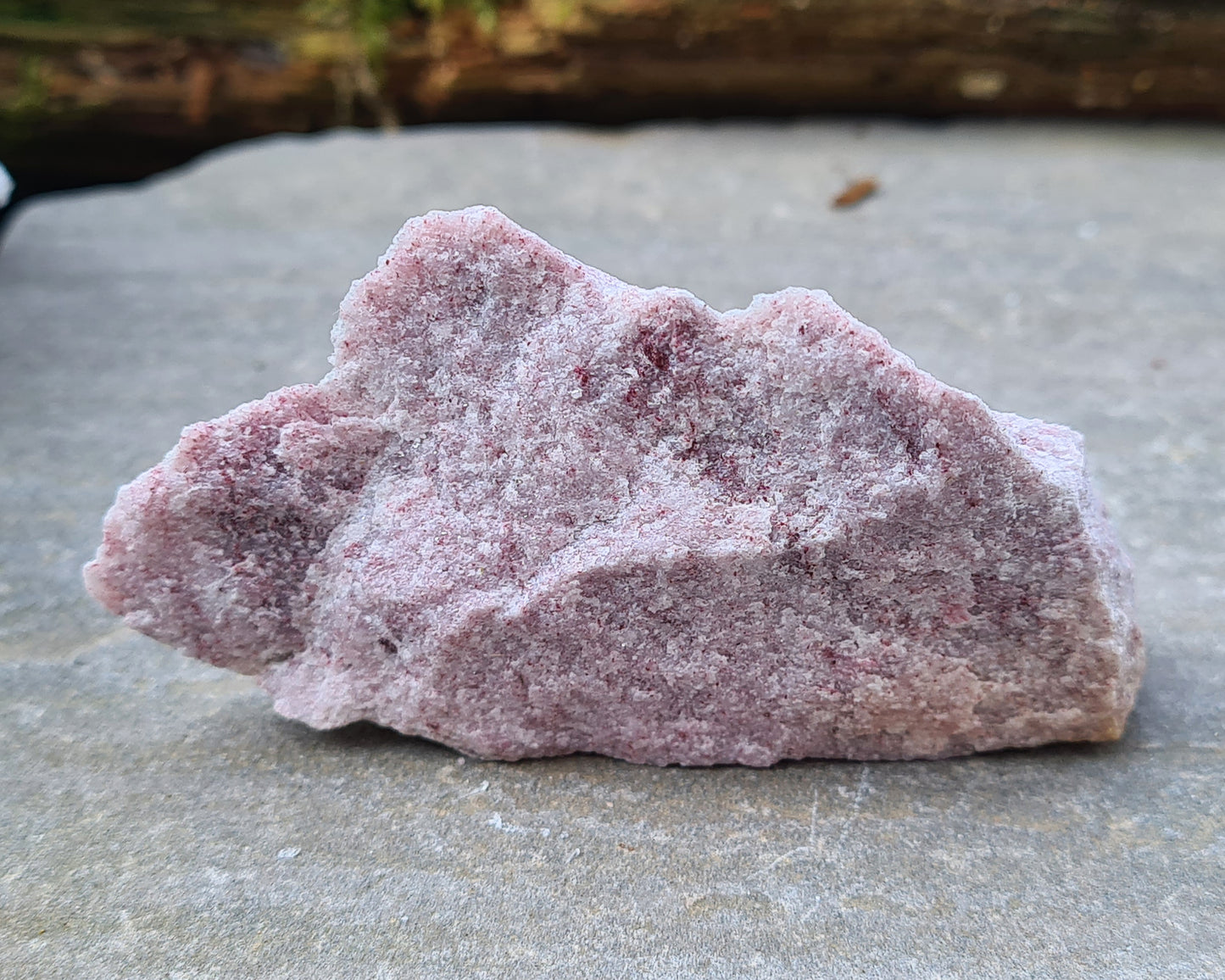 Discover the gentle energy of Pink Thulite. A beautiful palm stone to boost vitality, self-expression, and playful, heart-led energy.