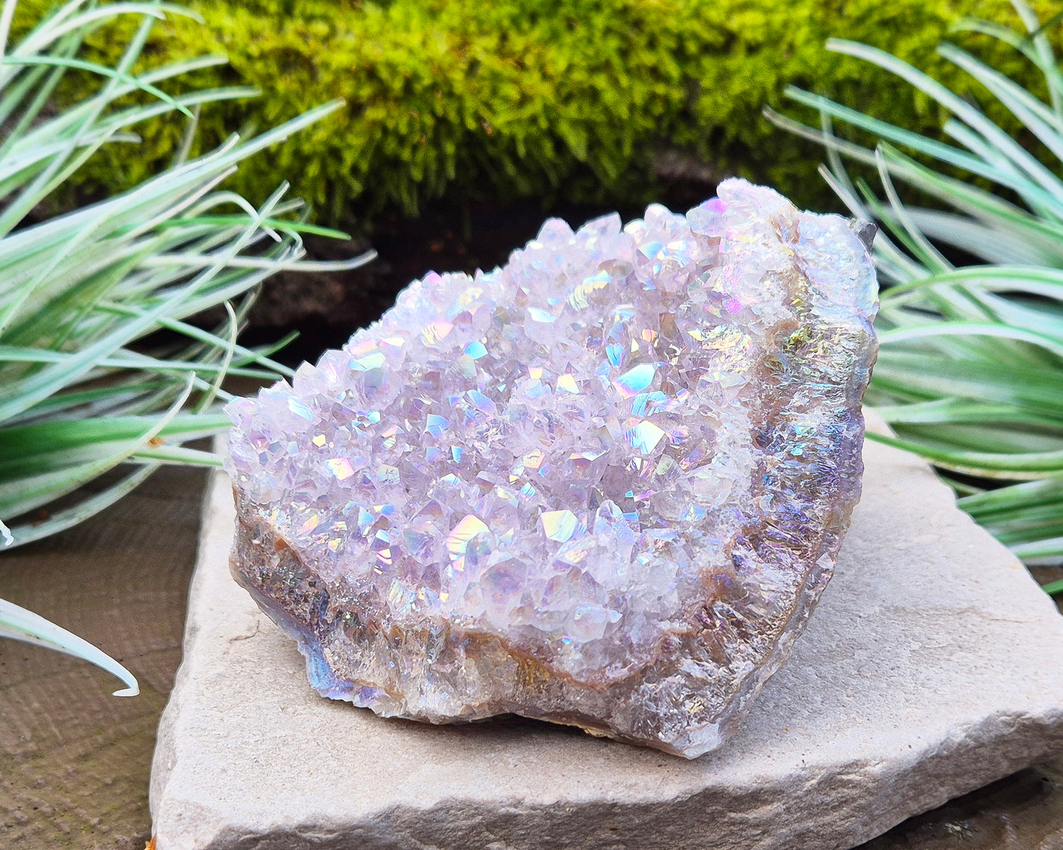 Sparkling Angel Aura Amethyst Crystal Cluster from Brazil. Base is curved but will sit on a flat surace.