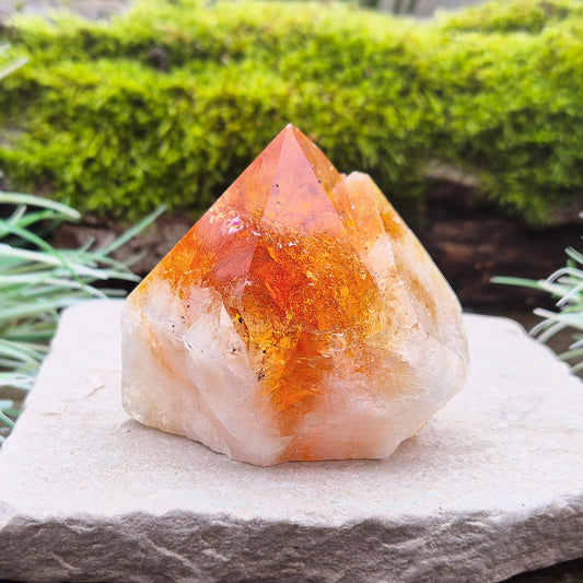 Citrine Crystal Standing Point from Brazil. Lovely deep golden orange colour with a double tip. Point is polished, sides are natural and the base is cut flat