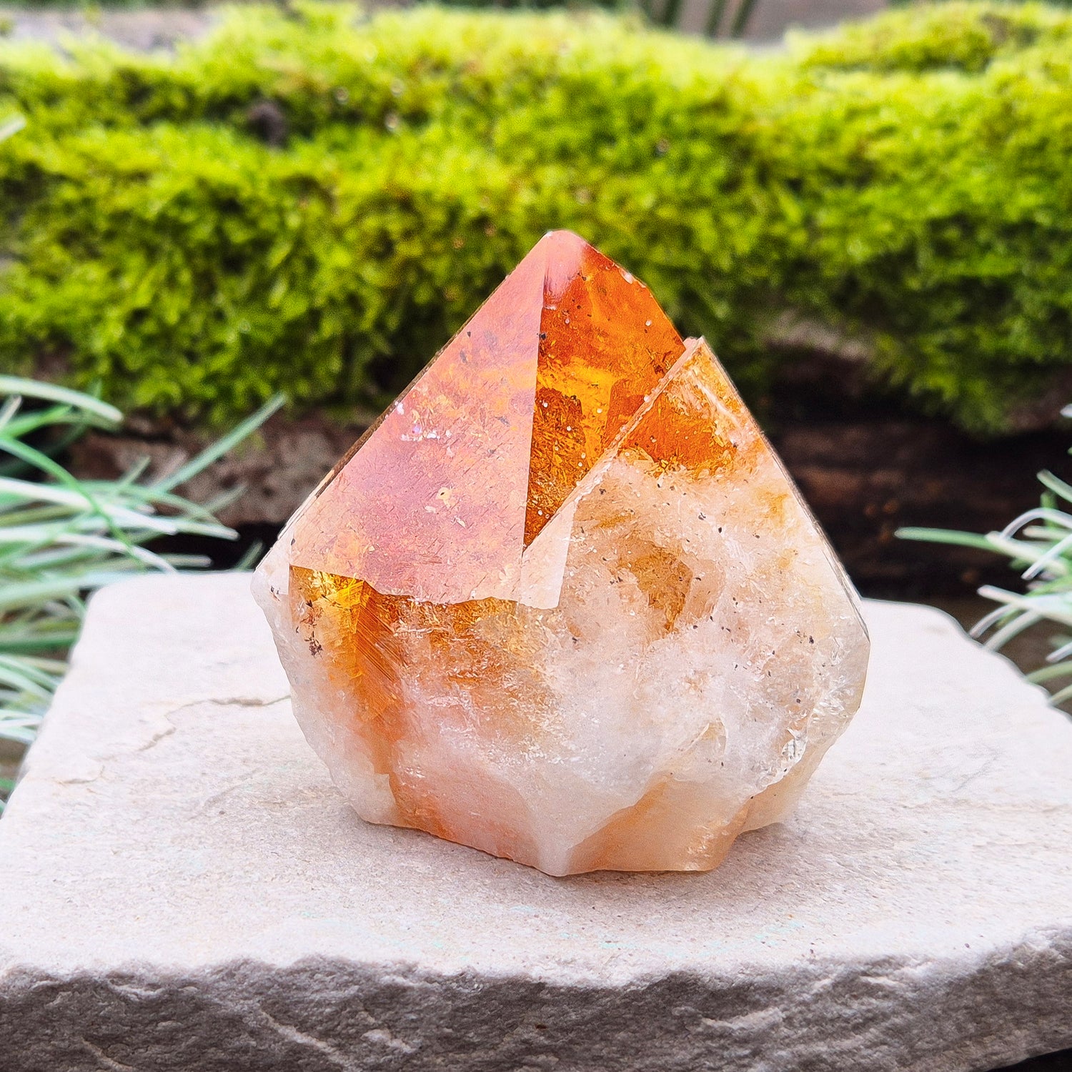 Citrine Crystal Standing Point from Brazil. Lovely deep golden orange colour with a double tip. Point is polished, sides are natural and the base is cut flat