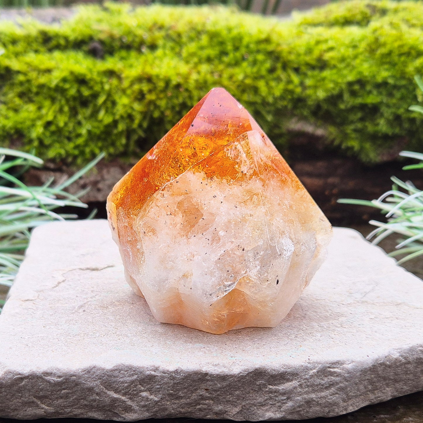 Citrine Crystal Standing Point from Brazil. Lovely deep golden orange colour with a double tip. Point is polished, sides are natural and the base is cut flat