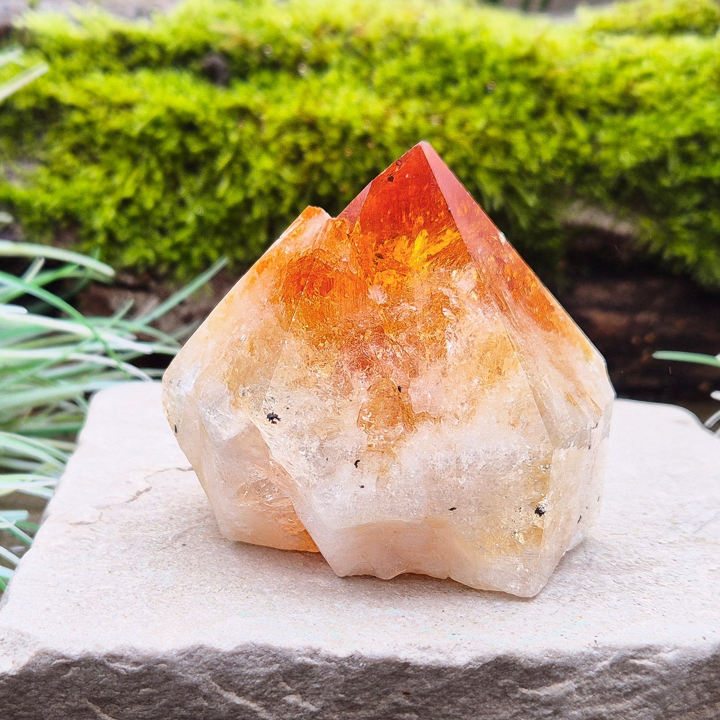 Citrine Crystal Standing Point from Brazil. Lovely deep golden orange colour with a double tip. Point is polished, sides are natural and the base is cut flat