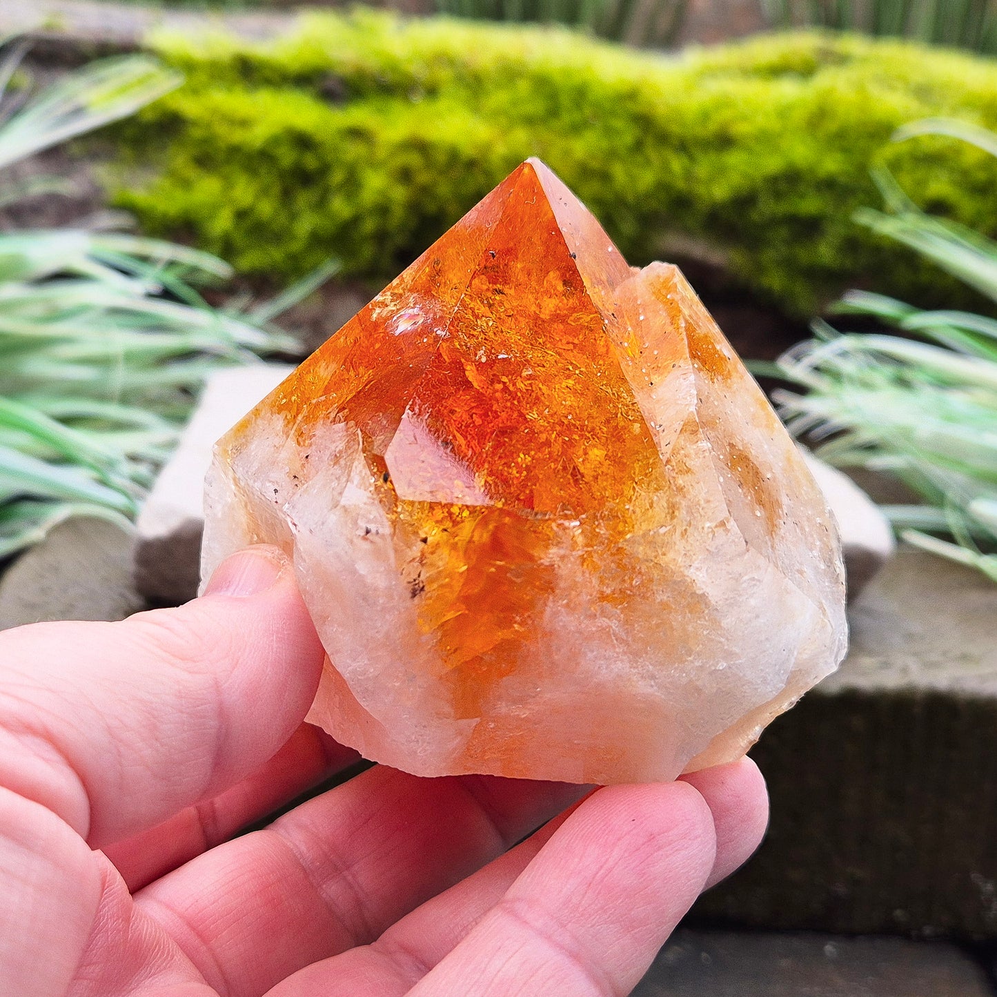 Citrine Crystal Standing Point from Brazil. Lovely deep golden orange colour with a double tip. Point is polished, sides are natural and the base is cut flat