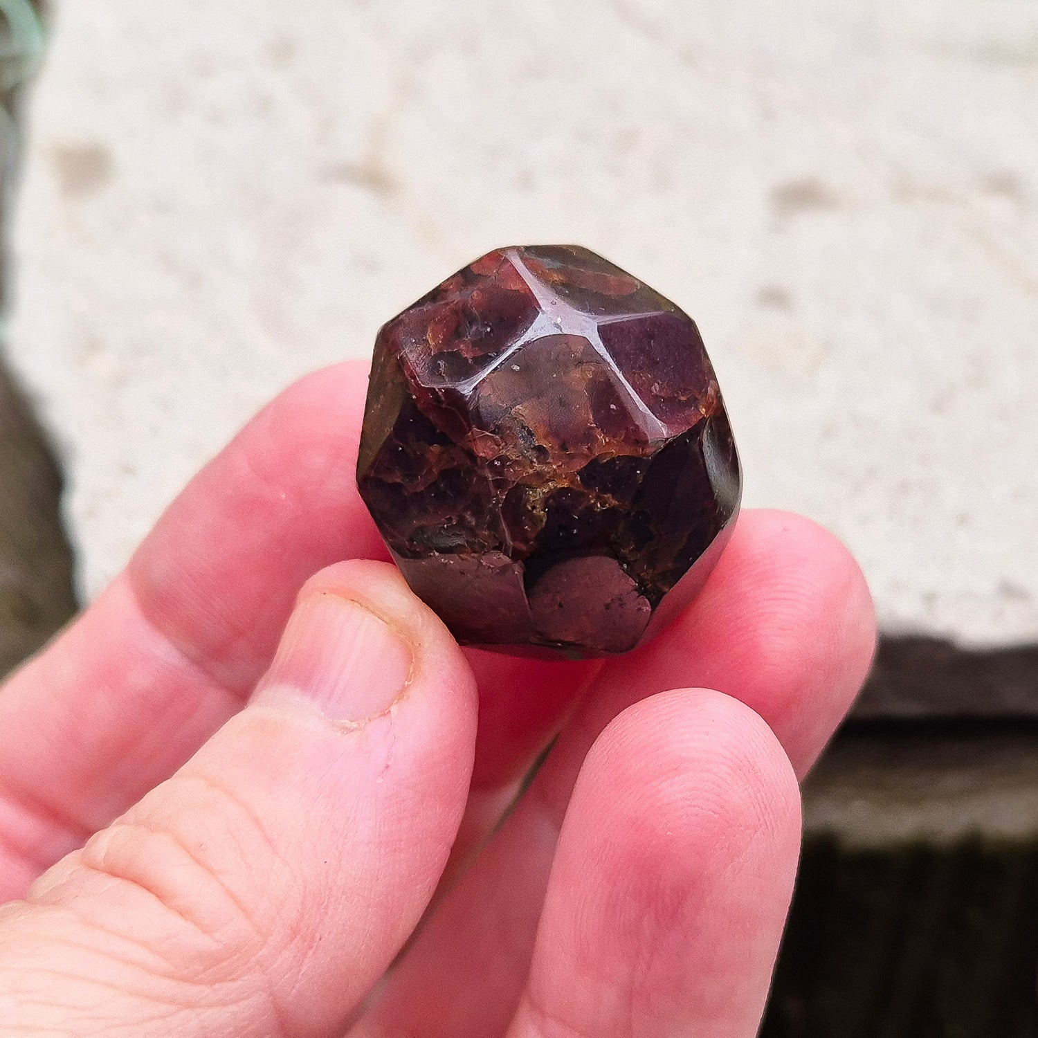 Almandine Garnet Crystal from India, featuring deep reddish-brown hues. Also known as Almandite