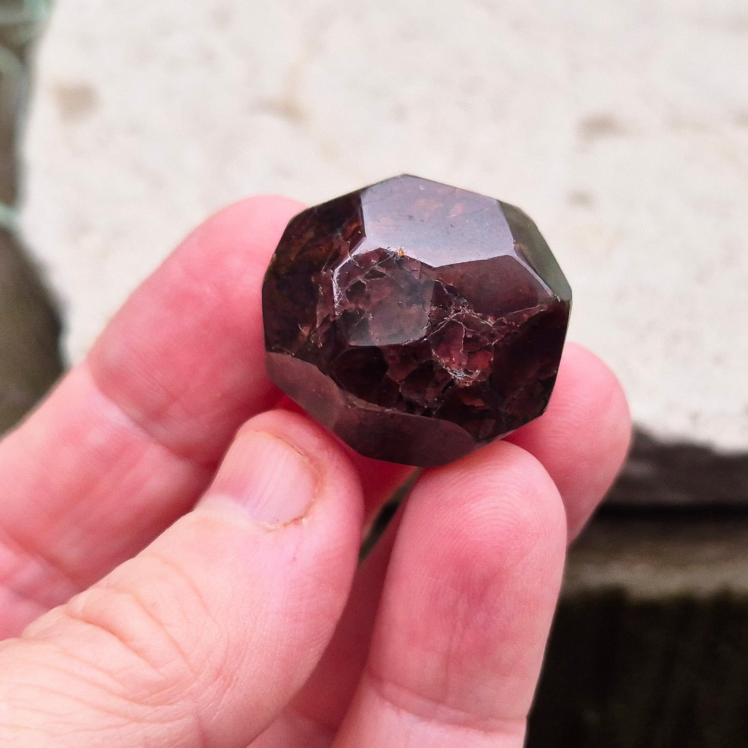 Almandine Garnet Crystal from India, featuring deep reddish-brown hues. Also known as Almandite