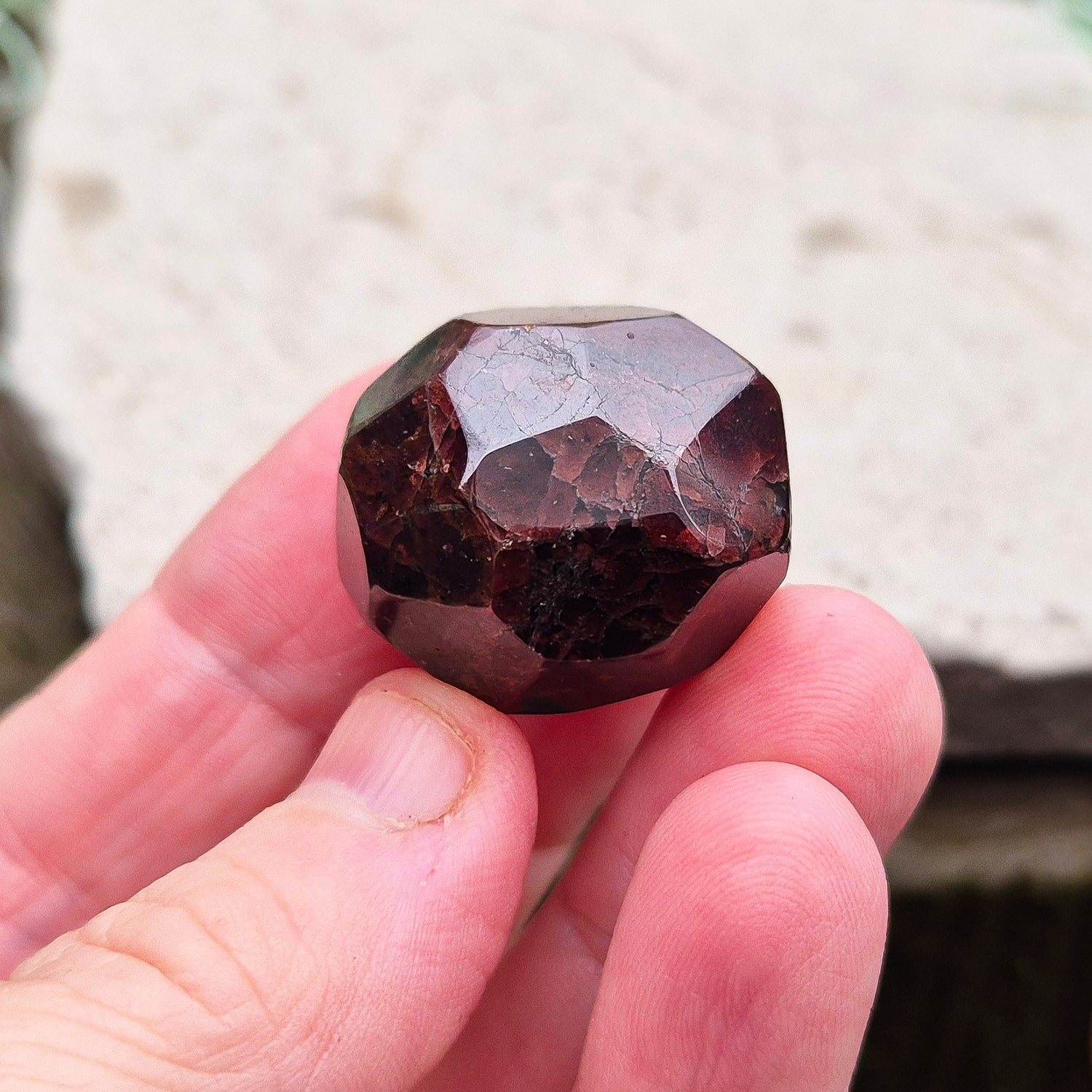 Almandine Garnet Crystal from India, featuring deep reddish-brown hues. Also known as Almandite