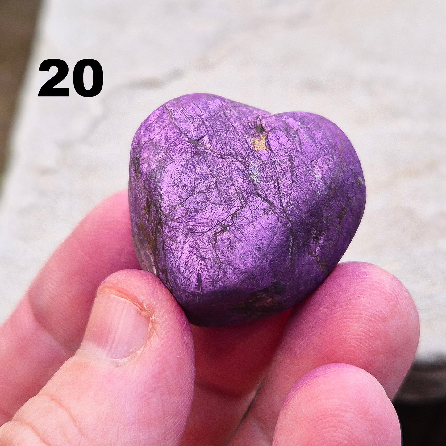 Purpurite. Beautiful purple specimens originating from Namibia. Known for its vibrant purple hue and unique matte, dusty finish. In the right light the purple hue will be more visible.
